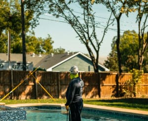 Poolside canopy trim ideas for breezier backyards in Dallas by S&P Tree Service.